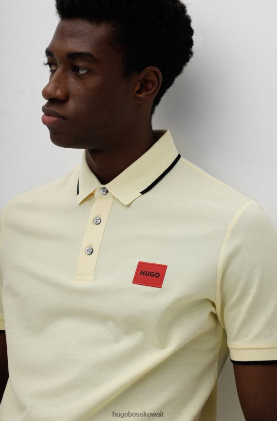 4TFNJN1808 أصفر فاتح Hugo Boss قميص بولو من قطن بيكيه © هوغو أصفر بقصة ضيقة مع ملصق شعار أحمر