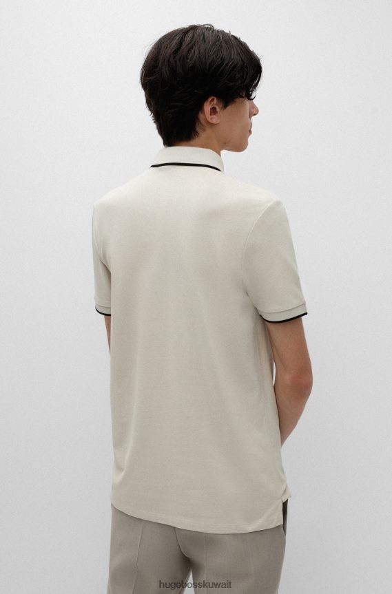 4TFNJN1811 البيج الفاتح Hugo Boss قميص بولو بقصة ضيقة من قطن بيكيه © باللون البيج الفاتح مع شعار هوغو باللون الأحمر