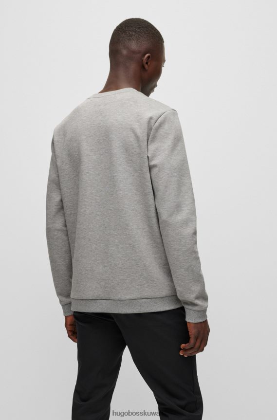 4TFNJN1818 رمادي فاتح Hugo Boss سويت شيرت من مزيج القطن بقصة عادية مع عمل فني شبكي من Hugo باللون الرمادي الفاتح
