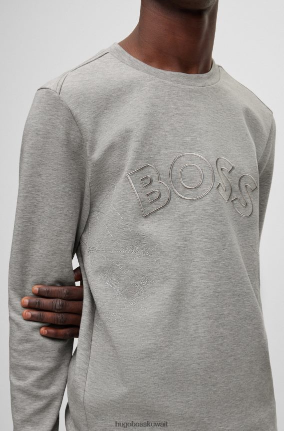 4TFNJN1818 رمادي فاتح Hugo Boss سويت شيرت من مزيج القطن بقصة عادية مع عمل فني شبكي من Hugo باللون الرمادي الفاتح