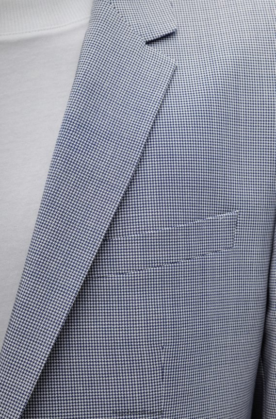 4TFNJN1838 أزرق فاتح Hugo Boss بدلة هوغو ذات لون أزرق فاتح بقصة ضيقة مصنوعة من قماش بيبيتا عالي الأداء