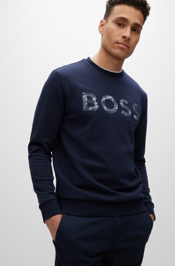 4TFNJN1898 أزرق غامق Hugo Boss سويت شيرت هوغو من قطن تيري باللون الأزرق الداكن بقصة عادية مع شعار منقوش