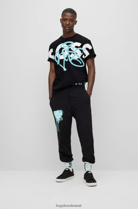 4TFNJN1904 أسود Hugo Boss قطعة سفلية رياضية من Hugo باللون الأسود مريحة مع أعمال فنية على الجدران