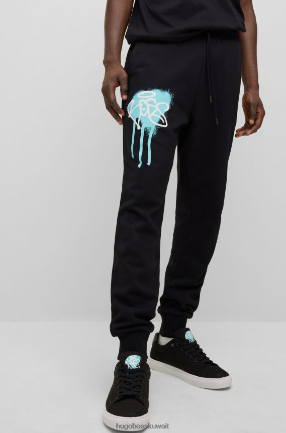 4TFNJN1904 أسود Hugo Boss قطعة سفلية رياضية من Hugo باللون الأسود مريحة مع أعمال فنية على الجدران