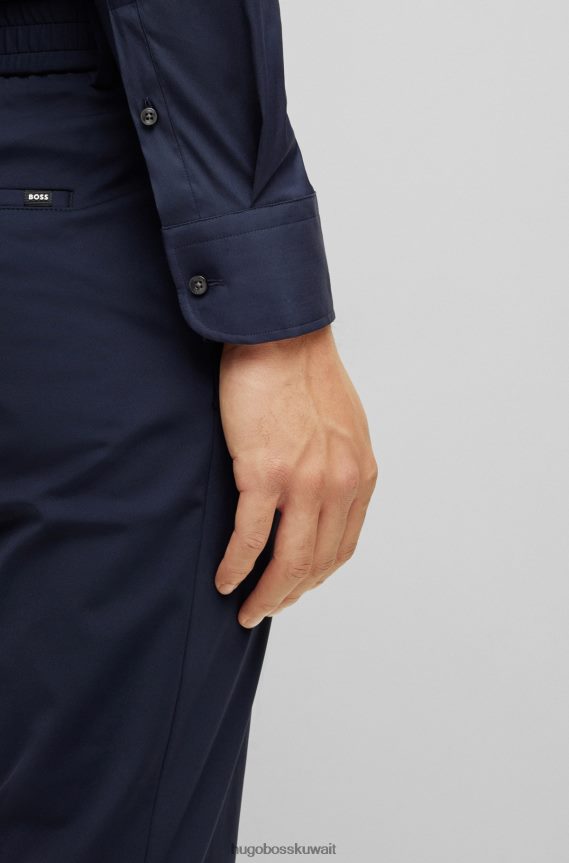 4TFNJN1946 أزرق غامق Hugo Boss قميص بقصّة ضيّقة مصنوع من قماش البوبلين القطني المخلوط سهل الكي باللون الأزرق الداكن