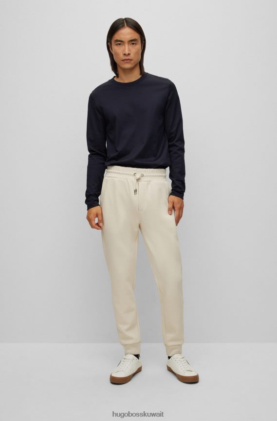 4TFNJN1984 أزرق غامق Hugo Boss تي شيرت من القطن المرسيري بقصة ضيقة مع هيكل غني باللون الأزرق الداكن