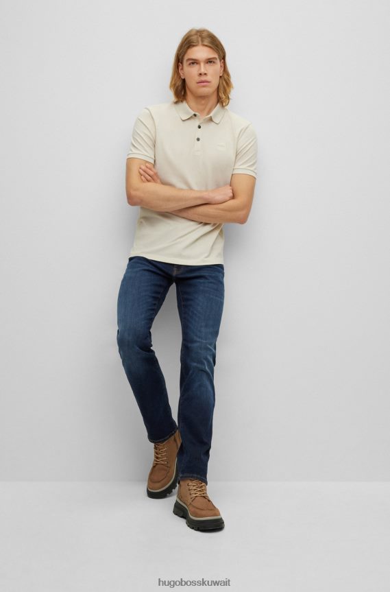 4TFNJN2004 أزرق غامق Hugo Boss جينز هوغو ذو قصة ضيقة باللون الأزرق الداكن من قماش الدنيم المريح المطاطي باللون الأزرق الرخامي