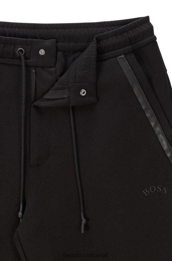 4TFNJN202 أسود/أبيض Hugo Boss بنطال رياضي هالبوا AJ 50456414 أسود
