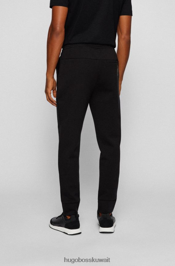 4TFNJN202 أسود/أبيض Hugo Boss بنطال رياضي هالبوا AJ 50456414 أسود