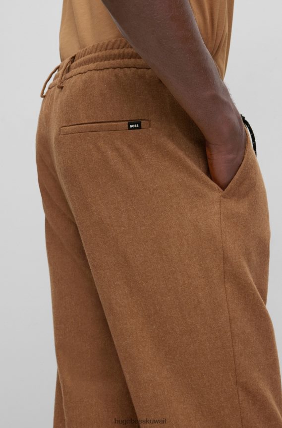 4TFNJN2036 اللون البيج Hugo Boss بنطلون هوغو بيج بقصة ضيقة مصنوع من قماش مطاطي عالي الأداء