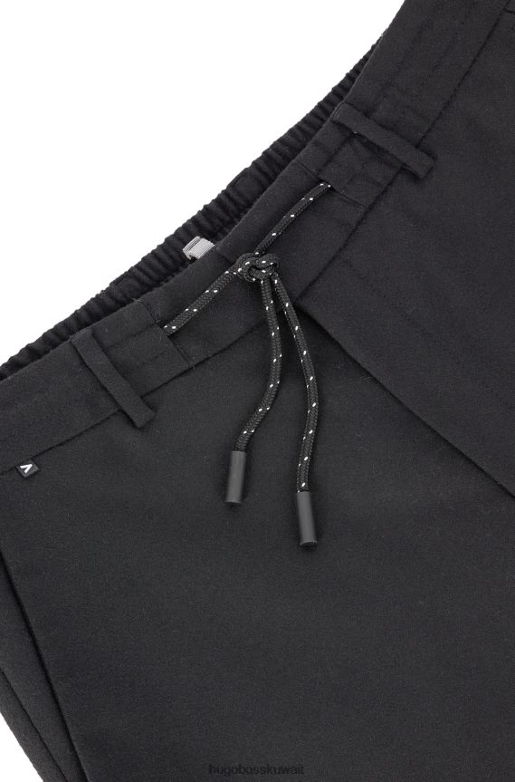 4TFNJN2038 أسود Hugo Boss بنطال بقصّة ضيّقة مصنوع من قماش هوغو الأسود عالي الأداء