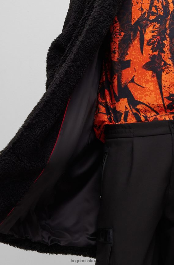 4TFNJN2069 أسود Hugo Boss معطف أسود بقصة عادية مصنوع من قماش تيدي هوغو