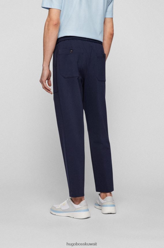 4TFNJN2074 أزرق غامق Hugo Boss بنطال بقصّة مدببة من الجيرسيه المطاطي باللون الأزرق الداكن من هوغو