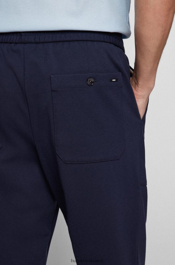 4TFNJN2074 أزرق غامق Hugo Boss بنطال بقصّة مدببة من الجيرسيه المطاطي باللون الأزرق الداكن من هوغو