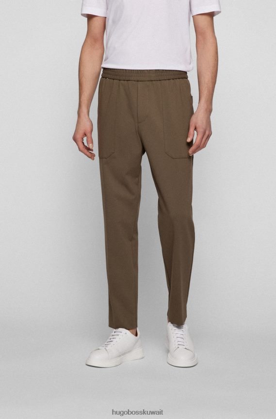 4TFNJN2075 بني Hugo Boss بنطال مدبب باللون البني من هوغو جيرسي مطاطي