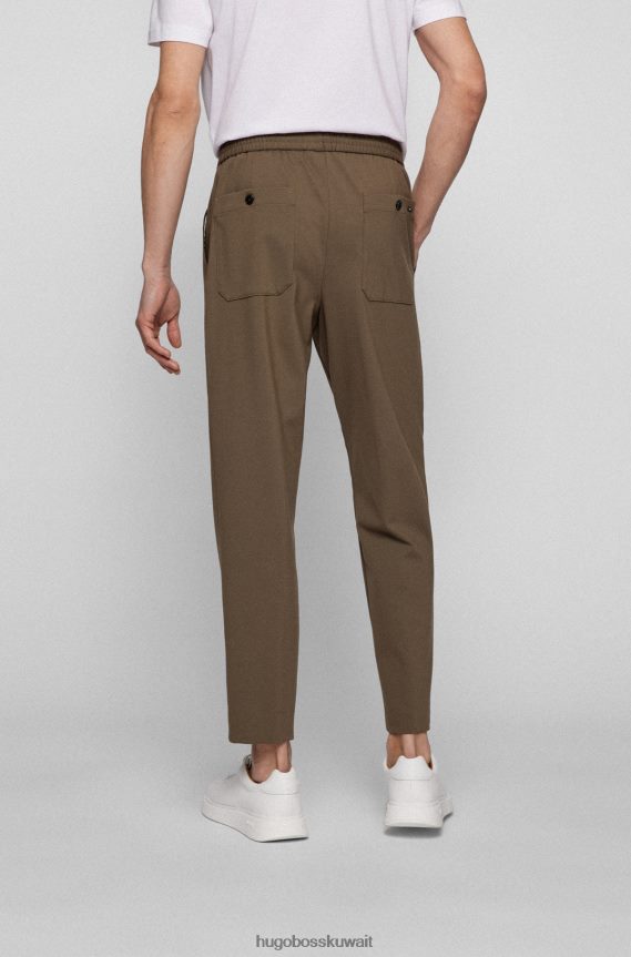 4TFNJN2075 بني Hugo Boss بنطال مدبب باللون البني من هوغو جيرسي مطاطي