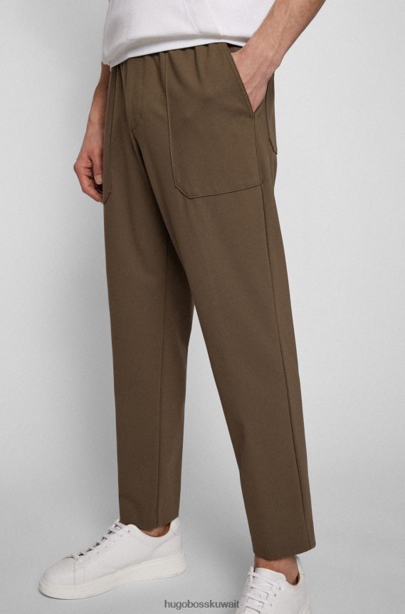 4TFNJN2075 بني Hugo Boss بنطال مدبب باللون البني من هوغو جيرسي مطاطي