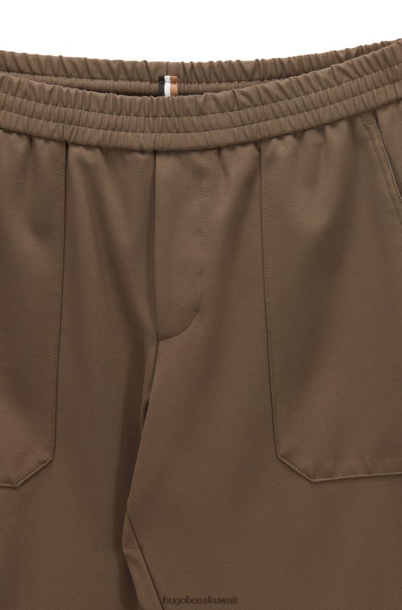 4TFNJN2075 بني Hugo Boss بنطال مدبب باللون البني من هوغو جيرسي مطاطي