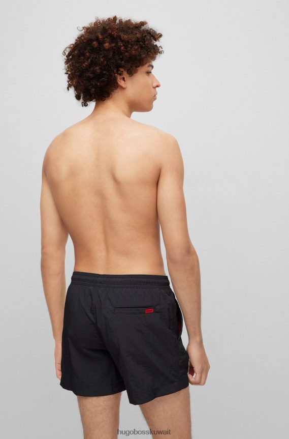 4TFNJN2140 أسود Hugo Boss هوغو شورت سباحة أسود سريع الجفاف مع ملصق شعار أحمر