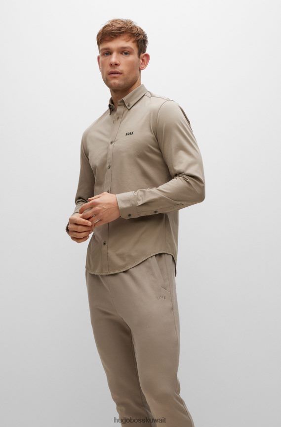 4TFNJN2190 اخضر فاتح Hugo Boss قميص Hugo ذو المقاس العادي مصنوع من مزيج القطن الجيرسي الممتص للرطوبة باللون الأخضر الفاتح