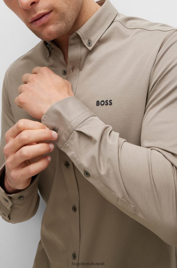 4TFNJN2190 اخضر فاتح Hugo Boss قميص Hugo ذو المقاس العادي مصنوع من مزيج القطن الجيرسي الممتص للرطوبة باللون الأخضر الفاتح