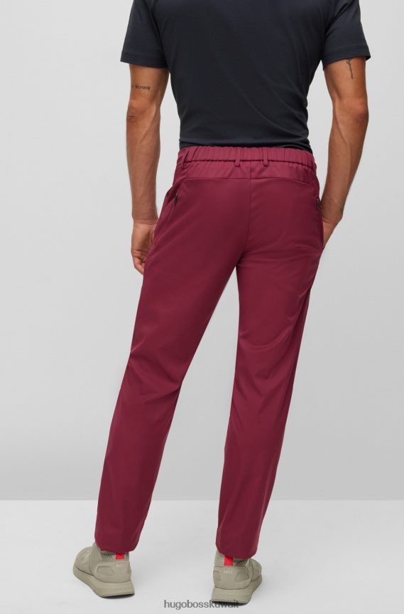4TFNJN2197 وردي غامق Hugo Boss بنطلون هوغو ذو قصة ضيقة باللون الوردي الداكن مصنوع من نسيج قطني مقاوم للماء