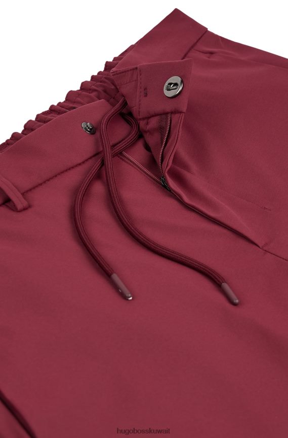 4TFNJN2197 وردي غامق Hugo Boss بنطلون هوغو ذو قصة ضيقة باللون الوردي الداكن مصنوع من نسيج قطني مقاوم للماء
