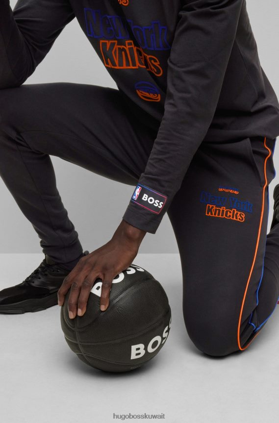 4TFNJN2208 الدوري الاميركي للمحترفين نيكس Hugo Boss وبنطلون بدلة رياضية من مزيج القطن مع شعارات NBA المطبوعة