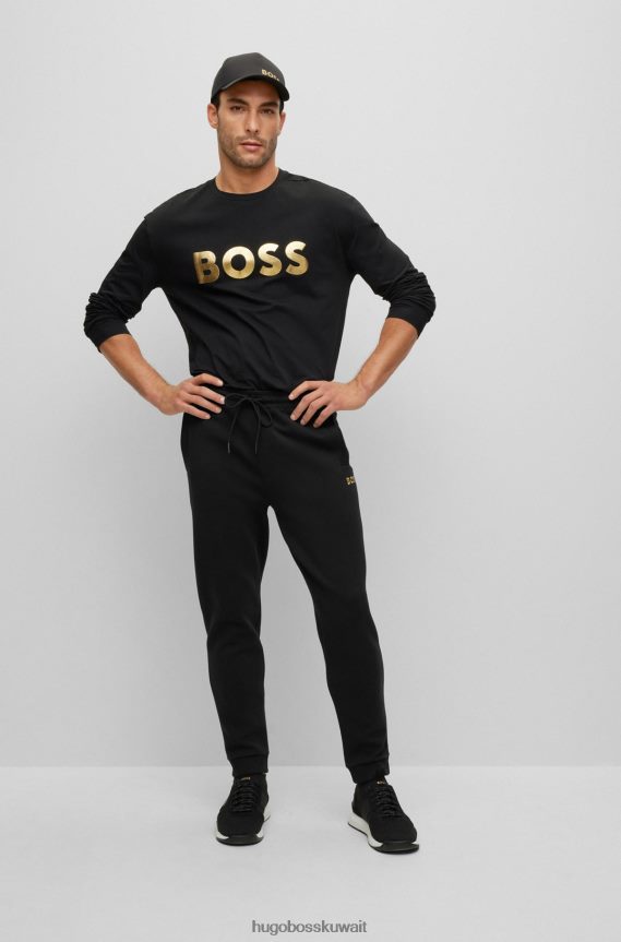 4TFNJN2237 أسود Hugo Boss بدلة رياضية من مزيج القطن من Hugo باللون الأسود مع شعار معدني