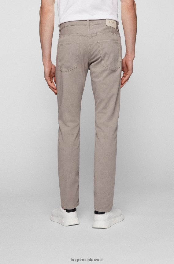 4TFNJN2278 البيج الفاتح Hugo Boss بنطال جينز ضيق من قماش الدنيم المطاطي ذو البنية الدقيقة باللون البيج الفاتح