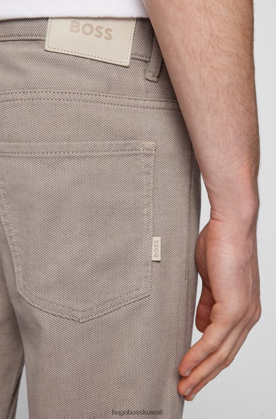 4TFNJN2278 البيج الفاتح Hugo Boss بنطال جينز ضيق من قماش الدنيم المطاطي ذو البنية الدقيقة باللون البيج الفاتح