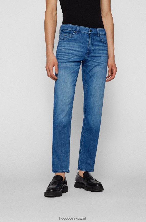 4TFNJN2302 أزرق Hugo Boss هوغو جينز بقصة عادية باللون الأزرق من قماش الدنيم الإيطالي ذو ملمس الكشمير الأزرق