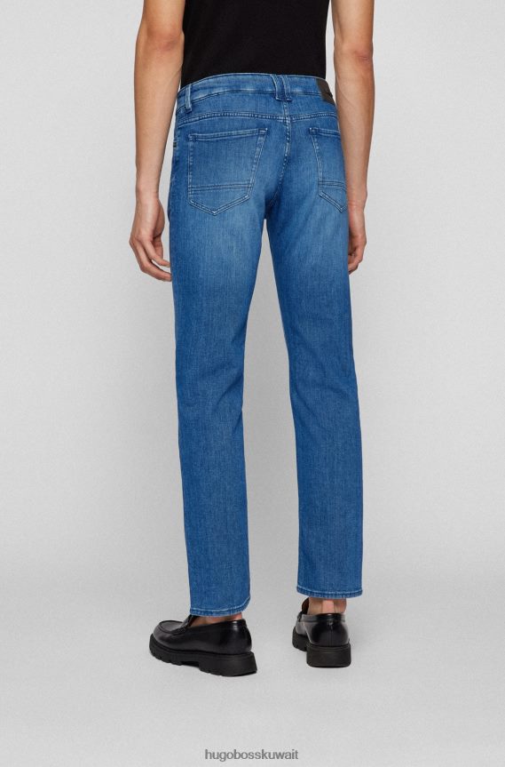 4TFNJN2302 أزرق Hugo Boss هوغو جينز بقصة عادية باللون الأزرق من قماش الدنيم الإيطالي ذو ملمس الكشمير الأزرق