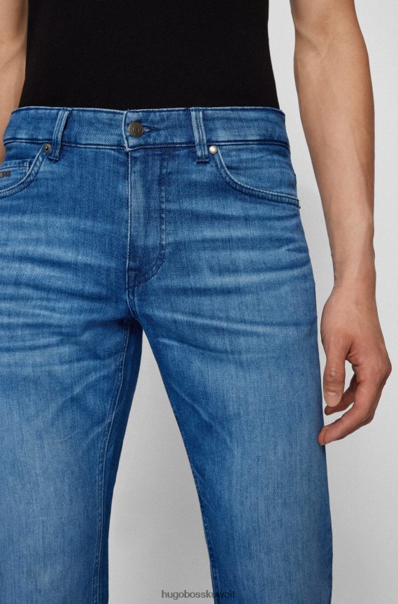 4TFNJN2302 أزرق Hugo Boss هوغو جينز بقصة عادية باللون الأزرق من قماش الدنيم الإيطالي ذو ملمس الكشمير الأزرق