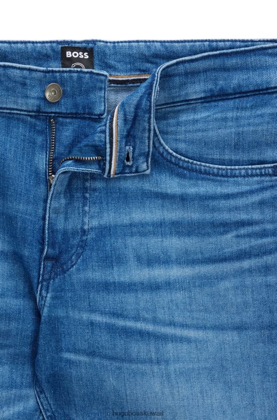 4TFNJN2302 أزرق Hugo Boss هوغو جينز بقصة عادية باللون الأزرق من قماش الدنيم الإيطالي ذو ملمس الكشمير الأزرق