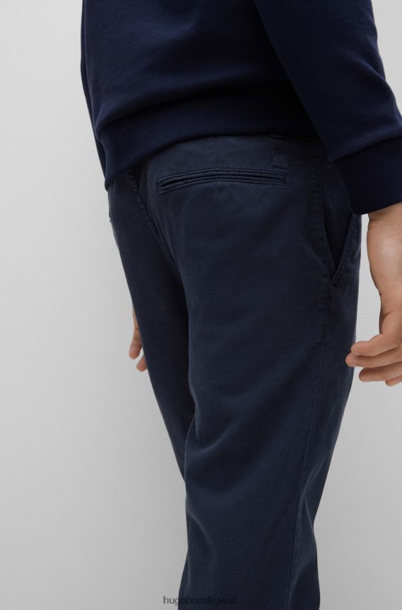 4TFNJN2305 أزرق غامق Hugo Boss بنطال بقصّة مدببة مصنوع من قماش هوغو المصنوع من مزيج القطن على شكل قرص العسل باللون الأزرق الداكن