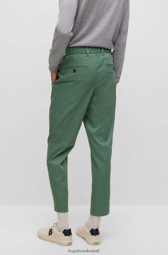 4TFNJN2358 أخضر Hugo Boss بنطال مستدق باللون الأخضر مع ساق قصيرة مصنوع من قماش هوغو عالي الأداء