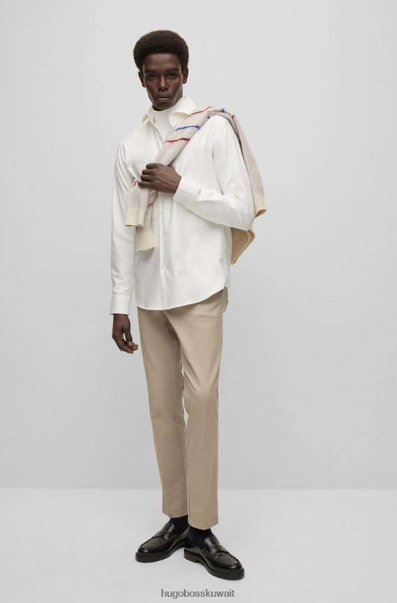 4TFNJN2427 البيج الفاتح Hugo Boss بنطال تشينو بقصة ضيقة مصنوع من قطن الجبردين المطاطي باللون البيج الفاتح