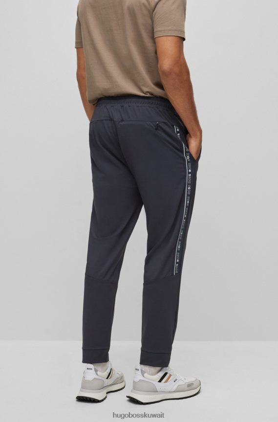 4TFNJN2432 أزرق غامق Hugo Boss بدلة رياضية زرقاء داكنة بقصة عادية مع شريط شعار هوغو