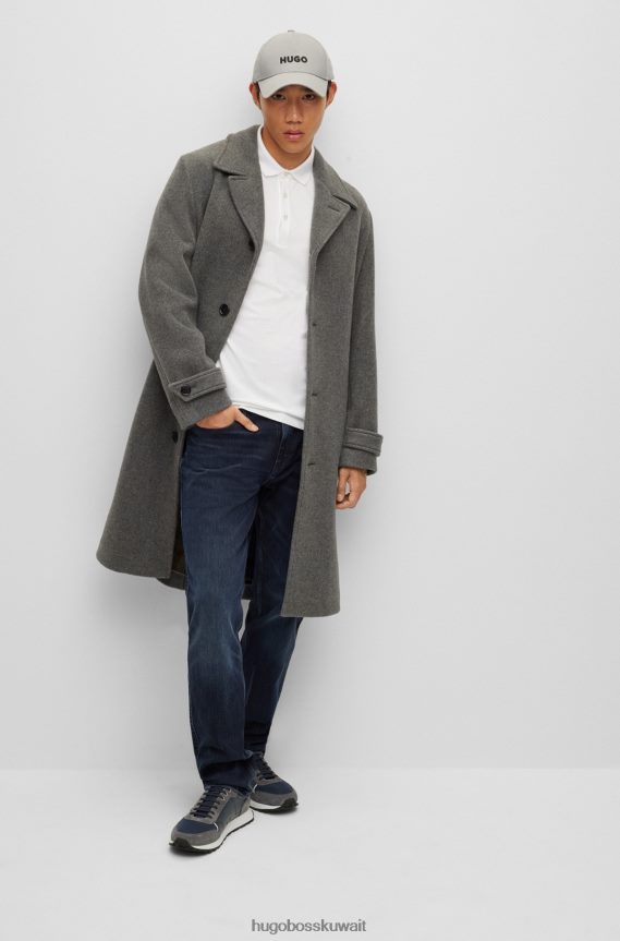 4TFNJN2441 أزرق غامق Hugo Boss جينز هوغو ذو قصة ضيقة باللون الأزرق الداكن من قماش الدنيم المطاطي باللون الأزرق والأسود