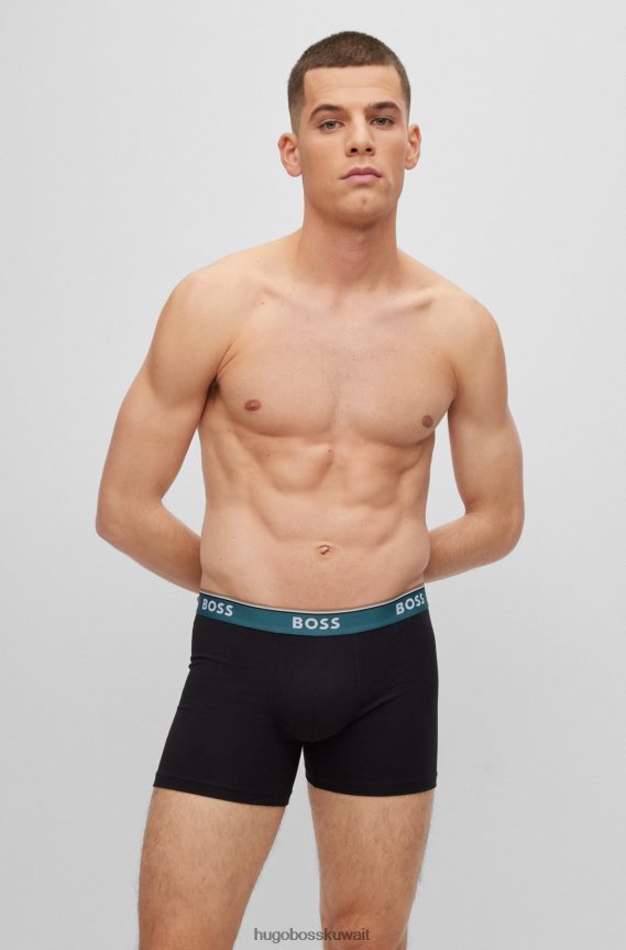 4TFNJN2458 أسود/أزرق Hugo Boss حزمة من ثلاثة سراويل داخلية من القطن المطاطي تحمل شعار Hugo باللون الأسود