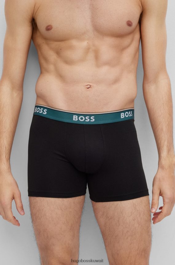 4TFNJN2458 أسود/أزرق Hugo Boss حزمة من ثلاثة سراويل داخلية من القطن المطاطي تحمل شعار Hugo باللون الأسود