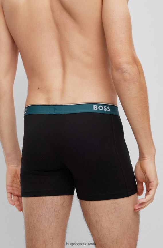 4TFNJN2458 أسود/أزرق Hugo Boss حزمة من ثلاثة سراويل داخلية من القطن المطاطي تحمل شعار Hugo باللون الأسود