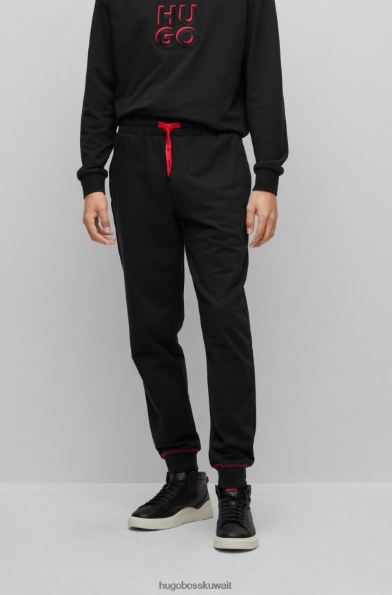4TFNJN2474 أسود Hugo Boss سروال رياضي من Hugo مصنوع من قطن تيري مع شعار مكدس باللون الأسود