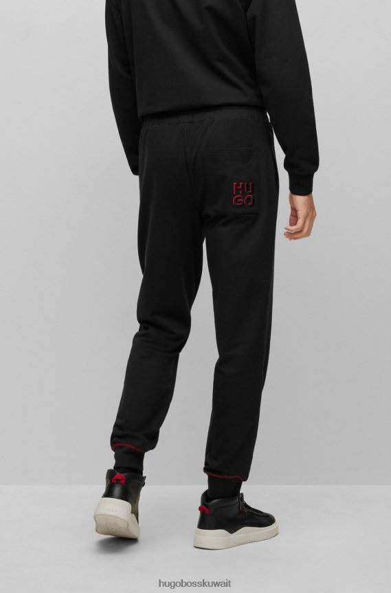 4TFNJN2474 أسود Hugo Boss سروال رياضي من Hugo مصنوع من قطن تيري مع شعار مكدس باللون الأسود