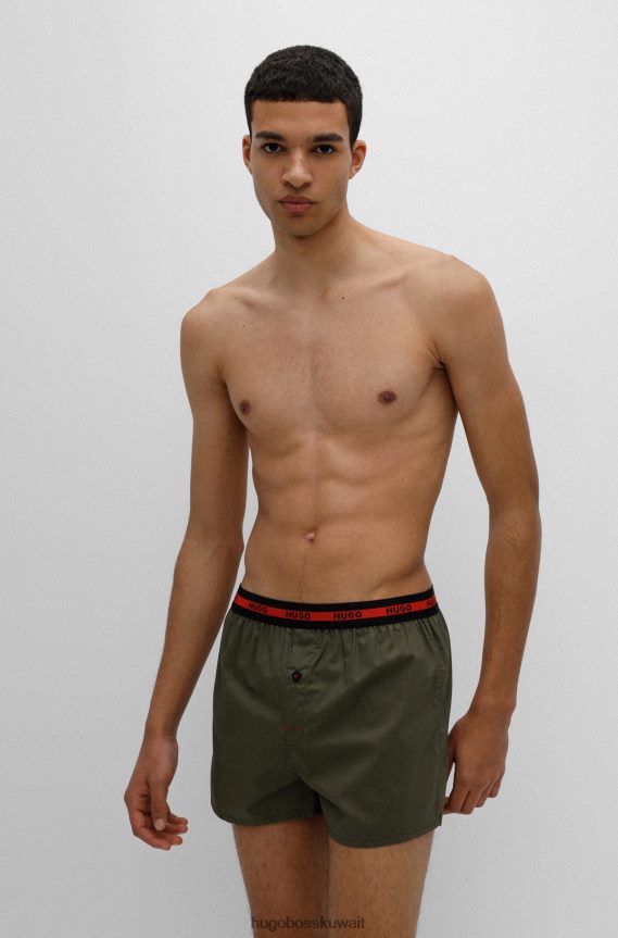 4TFNJN2495 أسود/أخضر Hugo Boss حزمة من قطعتين من شورتات الملاكم القطنية مع حزام خصر يحمل شعار Hugo باللون الأسود