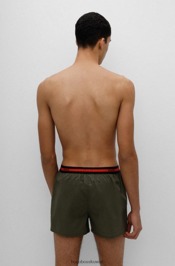 4TFNJN2495 أسود/أخضر Hugo Boss حزمة من قطعتين من شورتات الملاكم القطنية مع حزام خصر يحمل شعار Hugo باللون الأسود