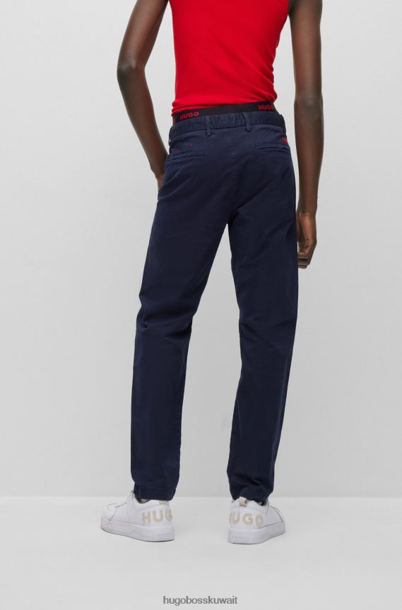 4TFNJN2500 أزرق غامق Hugo Boss بنطال تشينو Hugo بقصّة ضيقة مصنوع من قطن الجبردين المطاطي باللون الأزرق الداكن