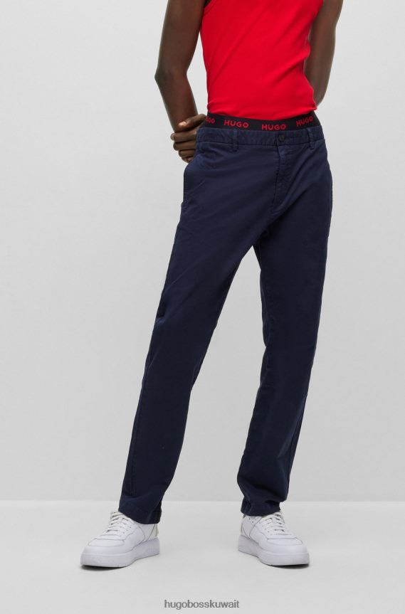 4TFNJN2500 أزرق غامق Hugo Boss بنطال تشينو Hugo بقصّة ضيقة مصنوع من قطن الجبردين المطاطي باللون الأزرق الداكن