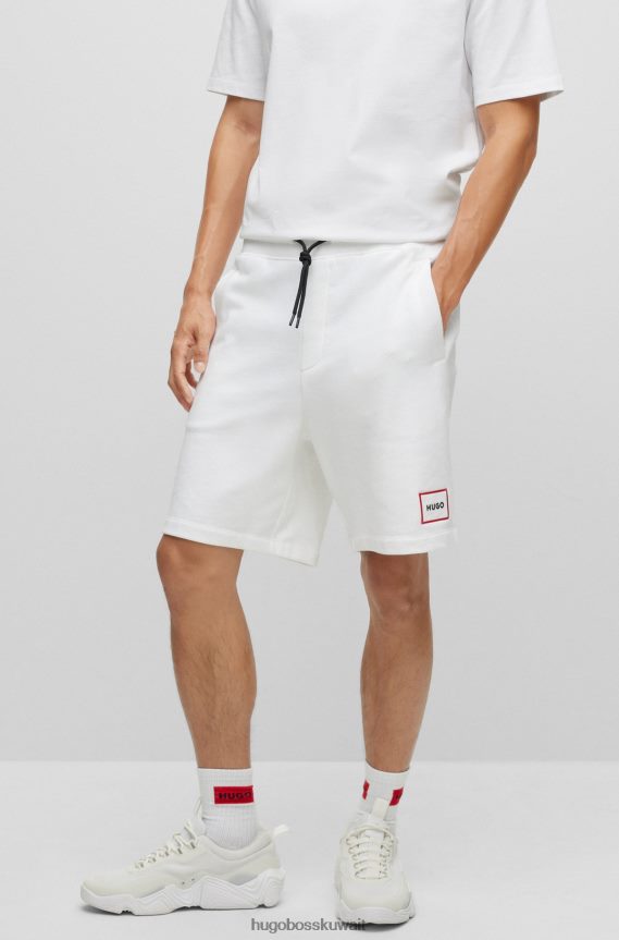 4TFNJN2509 أبيض Hugo Boss شورت مريح من قماش فرينش تيري مع شعار هوغو أبيض مؤطر